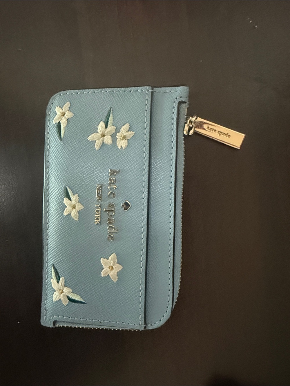 kate spade light blue floral zip-around wallet
